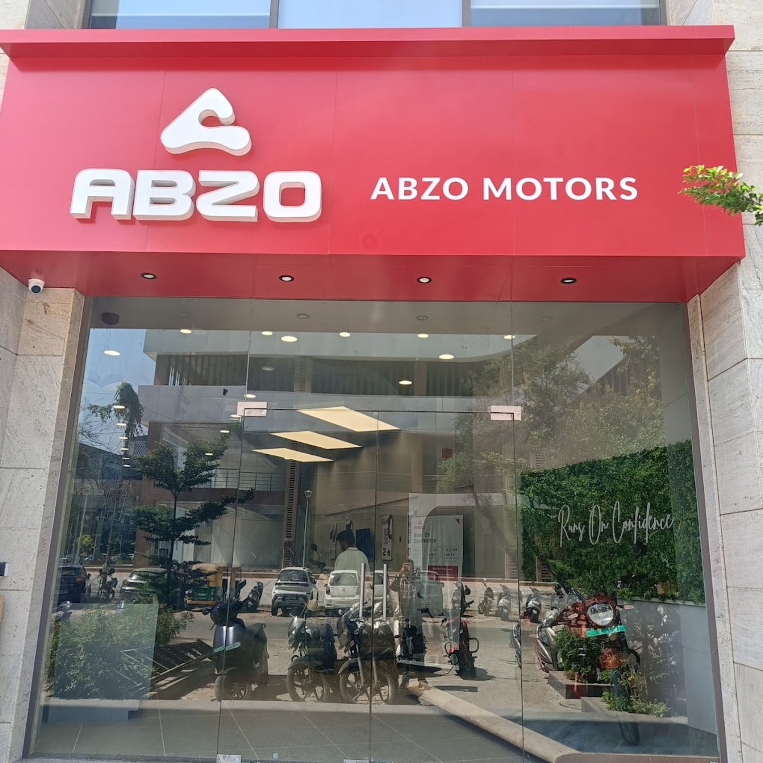 ABZO Motors showroom entrance in Ahmedabad